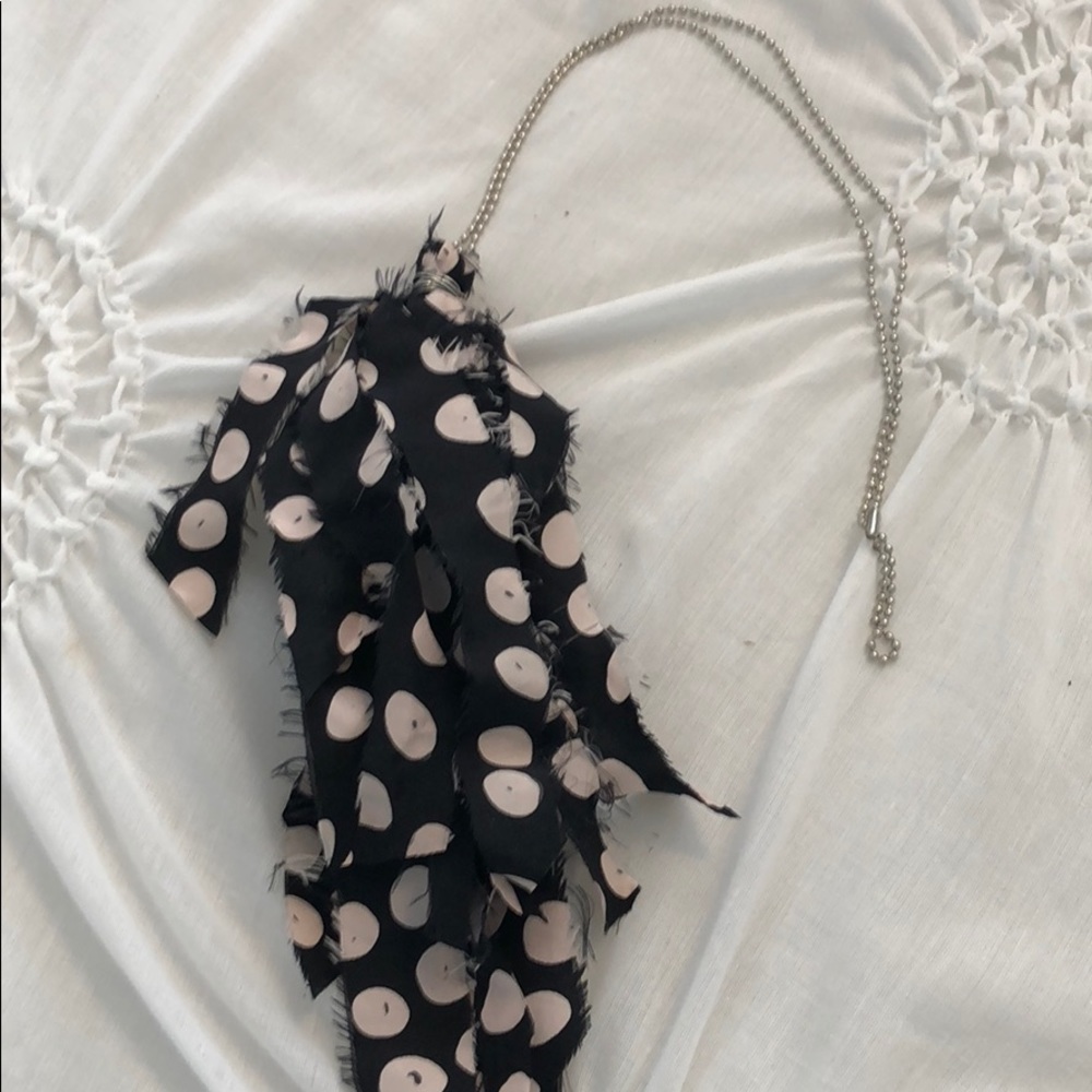 Women’s tassel necklace.